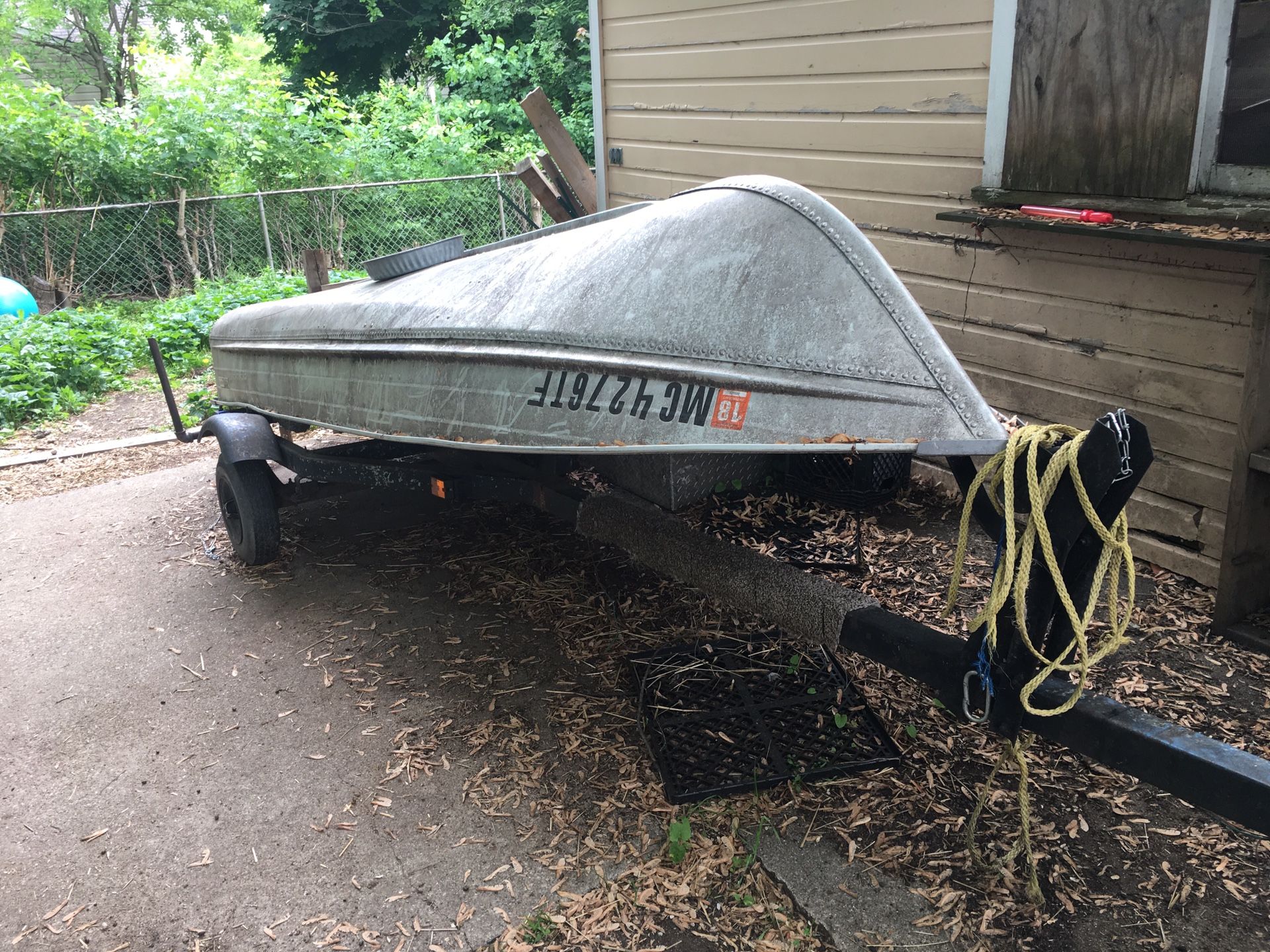 12' Montgomery ward row boat with motor