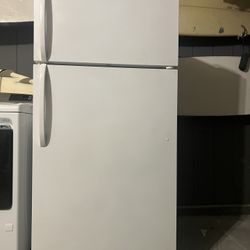 Excellent working white refrigerator top freezer