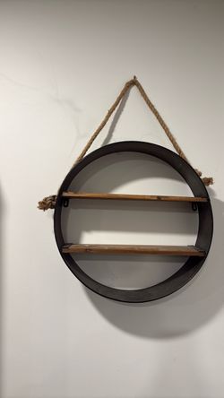 Beautiful Metal Round frame 2 wood shelves decor with rope hanger. Round only 17 1/2 X 17 1/2 from rope to bottom 27” see pictures .