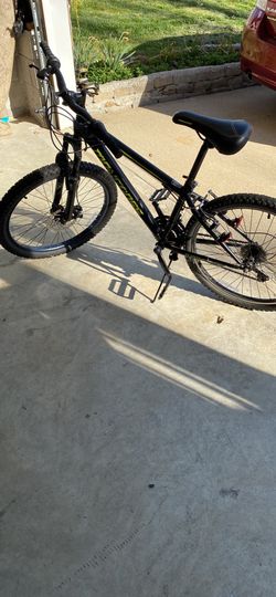 black and green mongoose mountain bike