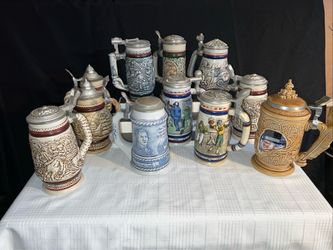 11 VINTAGE AVON BEER STEINS