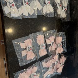 Free: I love MIA pink and white hair bows