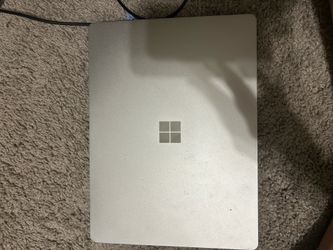 Microsoft Surface Laptop and Mouse