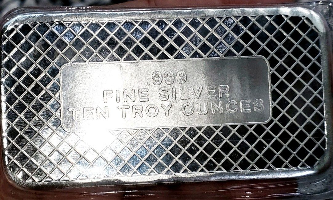 .999 fine Silver Bar Ten Troy Ounces mint condition is unopened- still vaccum sealed in original packaging