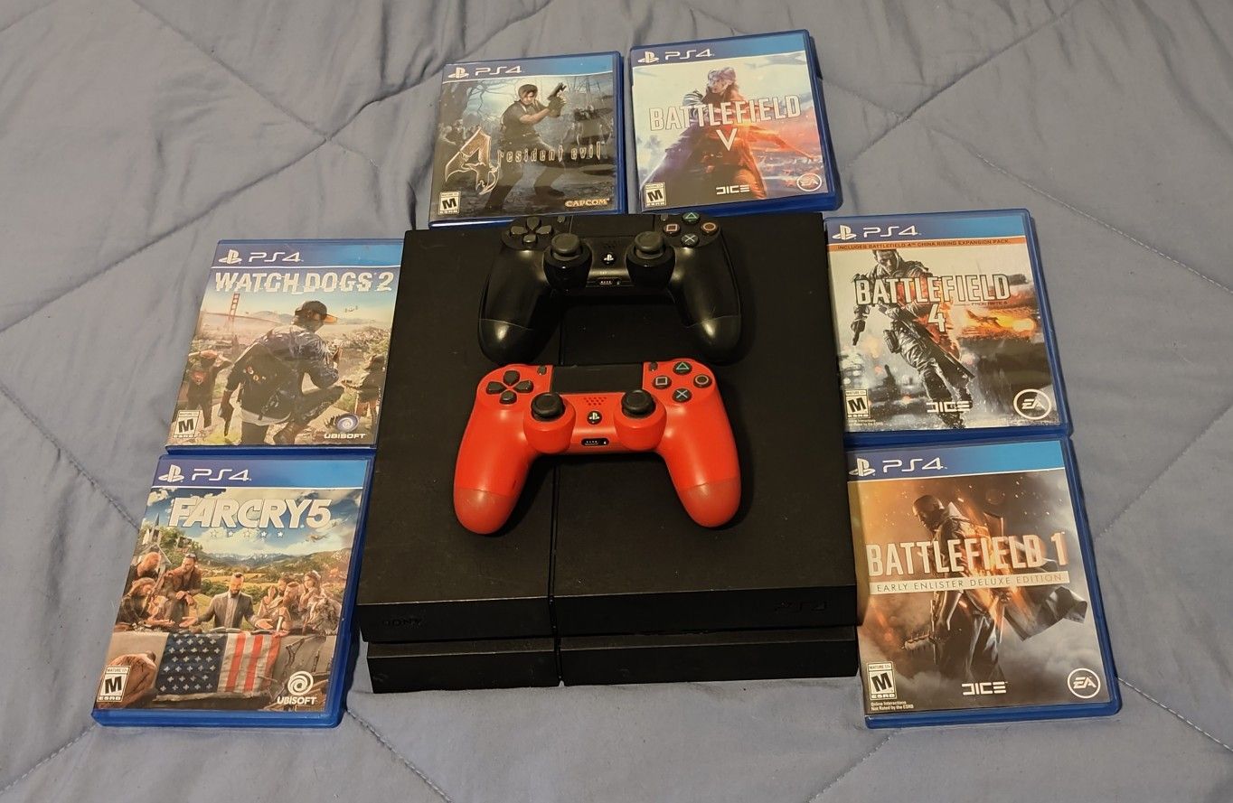 PS4 With Controllers And Games