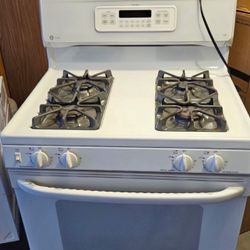 Great working GE Gas Stove Oven with 4 burners 