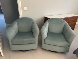 Pair of light blue /Teal Velvet Swivel Accent Chairs