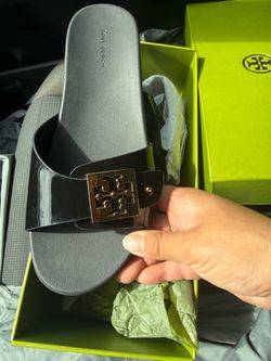 Brand new Tory Burch Mellow Buckle Slides, size 9, never worn, original box. $135 OBO