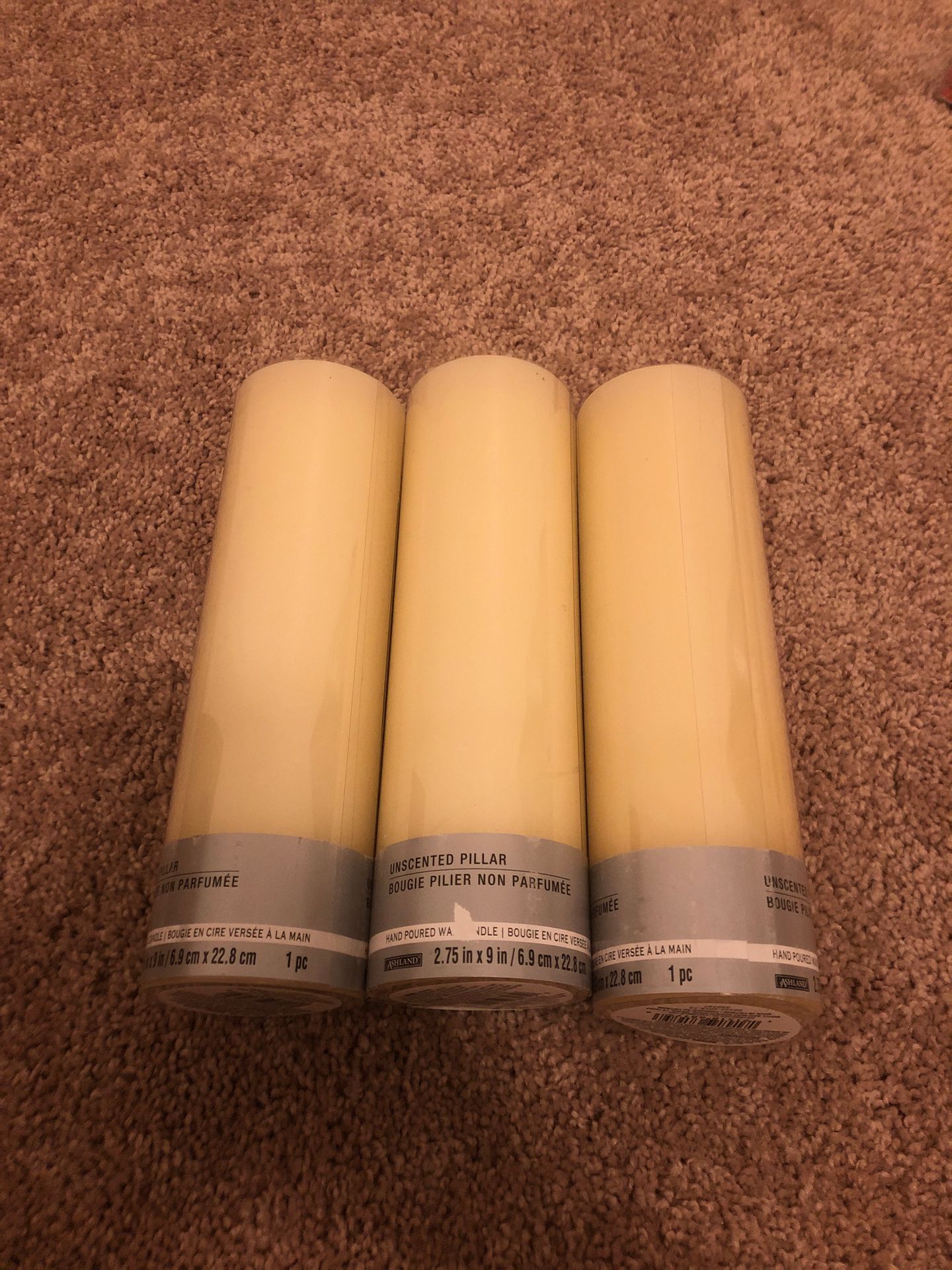 Unscented pillar candles, never used