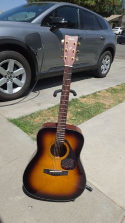 Guitar, tuner and Quality Strings
