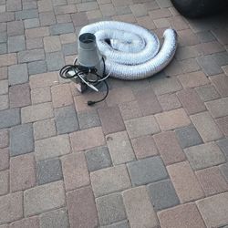 Dryer vent booster with expandable hose