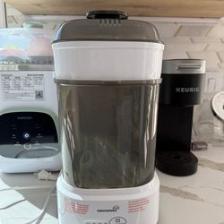 Compact bottle sterilizer