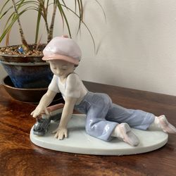 Lladro Porcelain Figurine “Boy Playing With Train”