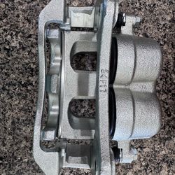 Front left disc brake caliper w/bracket