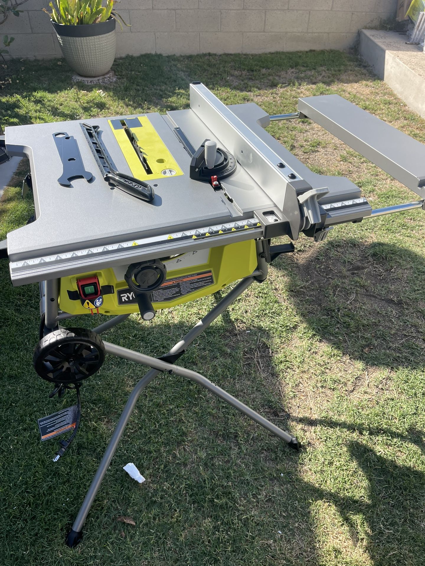 RYOBI 15 Amp 10 in. Expanded Capacity Portable Corded Table Saw With Rolling Stand