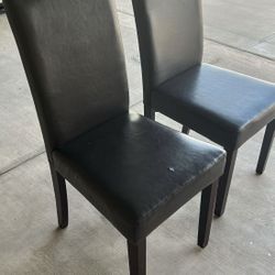 2 Dark Brown Faux Leather Chairs 