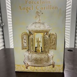 "Porcelain  Mr. Christmas Porcelain Angel Carillon."