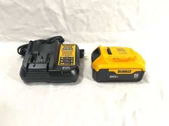 Brand new DeWalt 5Ah battery, and new charger