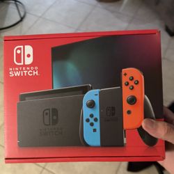 Nintendo Switch With Mario Kart and Super smash Bros 