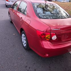 RED Toyota Corolla 2010