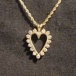 10k Gold  Heart Charm Sorrounded  By Diamonds  With 14k Gold Rope Chain