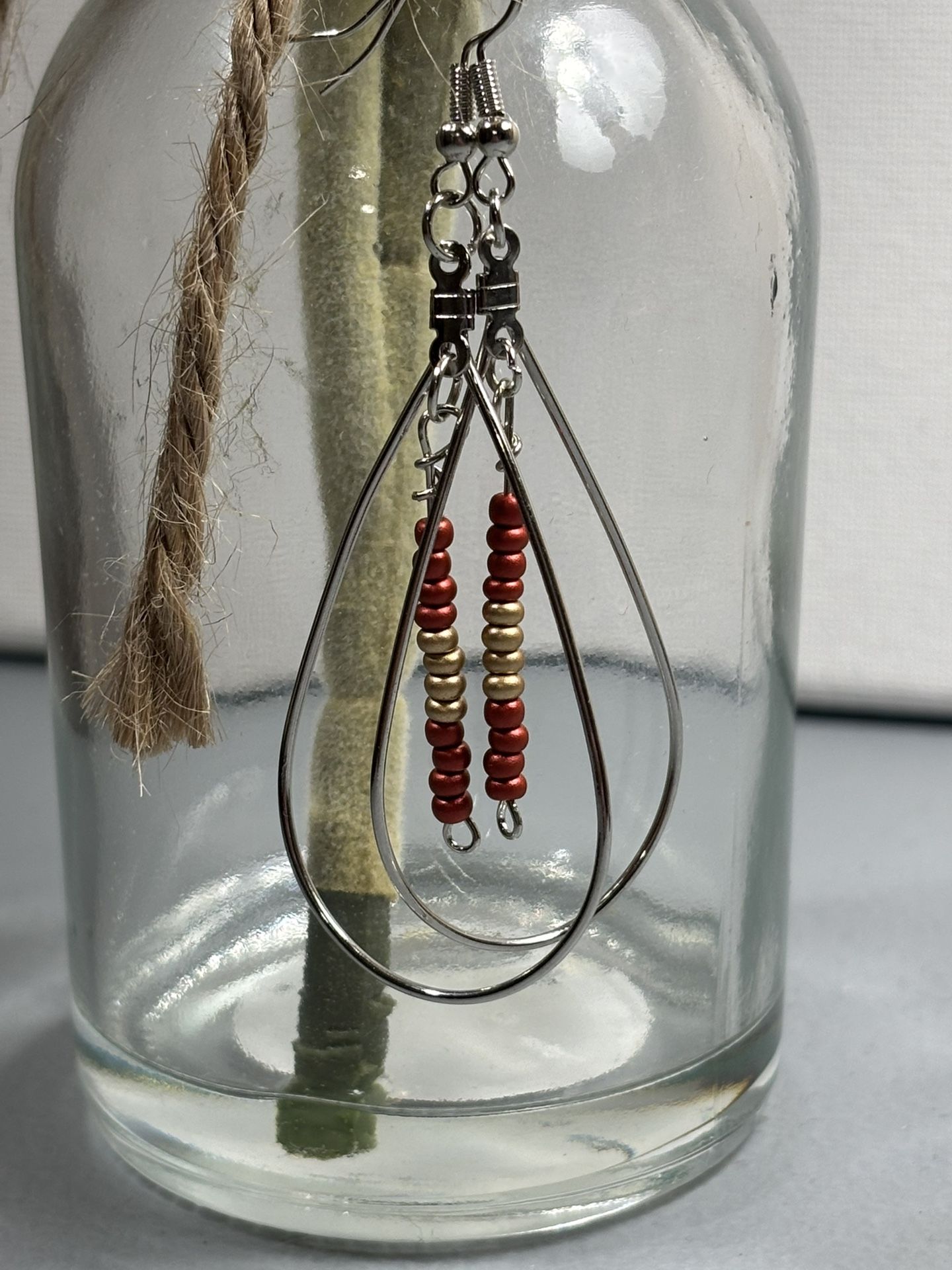 Tear Drop Earrings With Maroon And Gold Beading