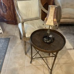 Tea table and chair included. 