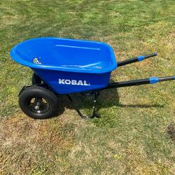 Dual wheel wheelbarrow