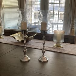 (2) 19in tall silver plated pillar candle holders