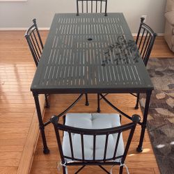 Table and four chairs