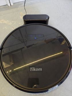 Black Robot Vacuum and Mop Tikom G8000 Robot Vacuum Cleaner Strong Suction Extensively Cleaned