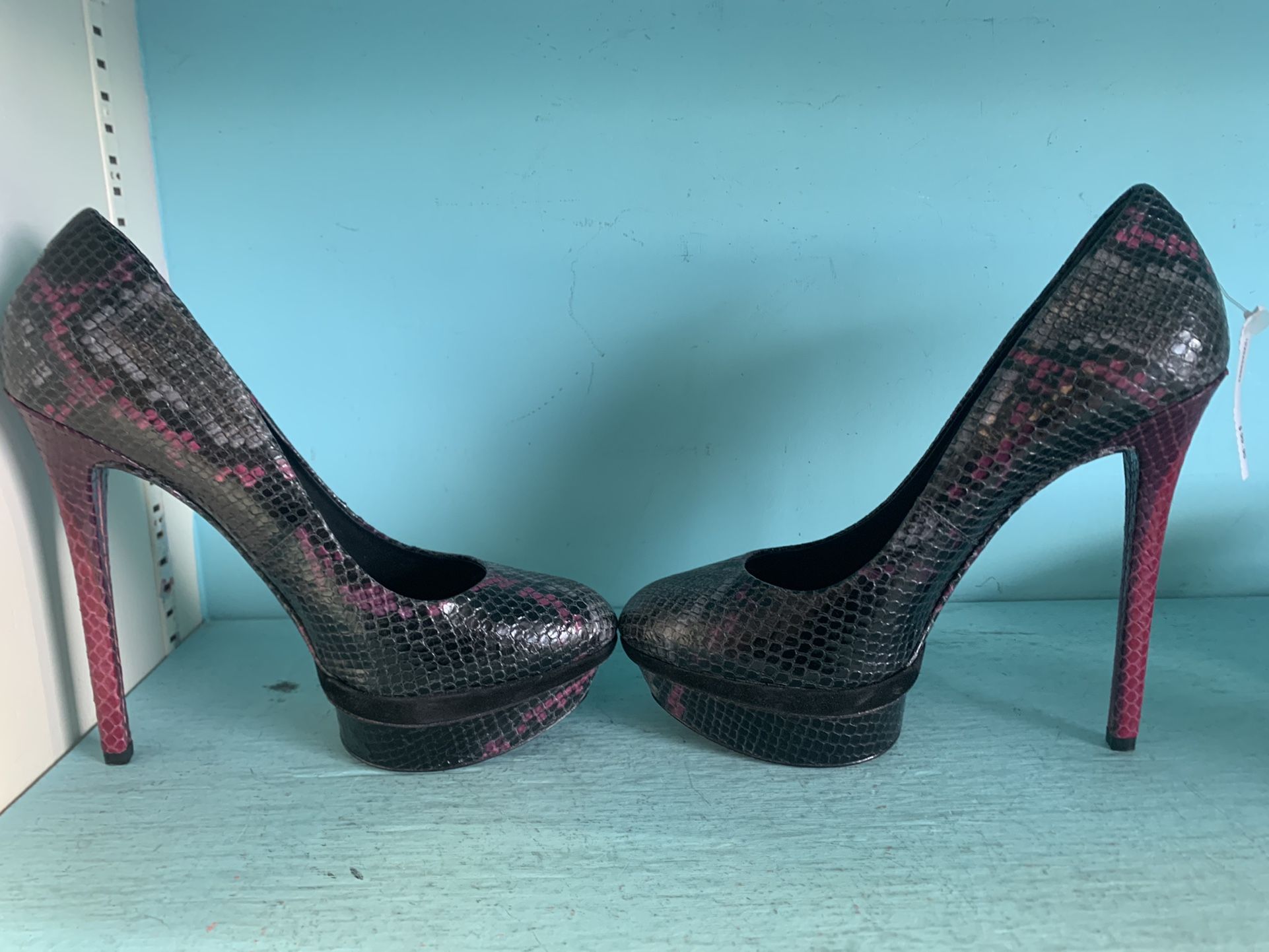 Brand new Brian Atwood pink and gray snake print heels. 