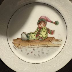 Hand Painted Ceramic Sledding 