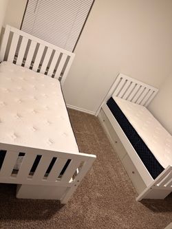Twin beds with mattress