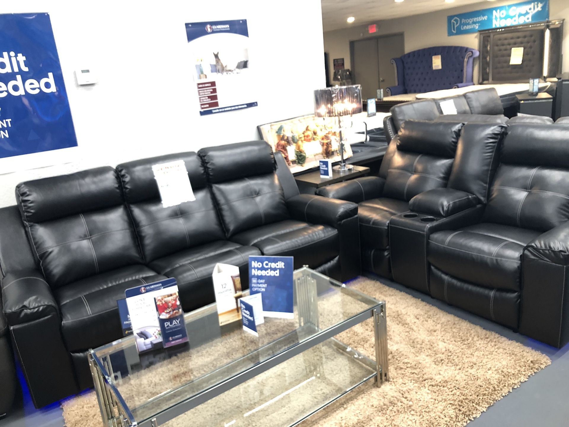 Brand new black leather reclining sofa and loveseat
