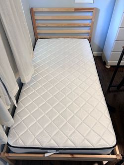 Twin size bed frame and mattress