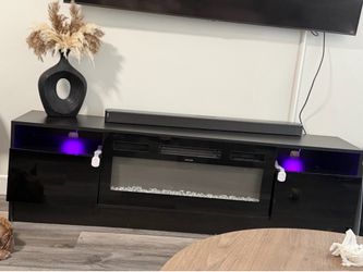 Tv console with fireplace