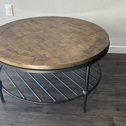 Bassett Mirror Company Belgian Luxe Emery Round Cocktail Table in Rust