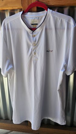 Greg Norman baseball collar polo shirt.

*Baseball Collar Micro Pique Shark Polo
White
Pre-owned