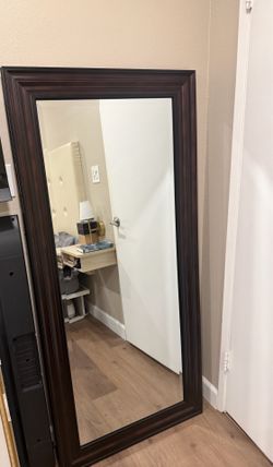 Rectangle brown glass mirror $50