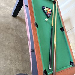 A versatile gaming table, convertible between air hockey and billiards. 🎱 