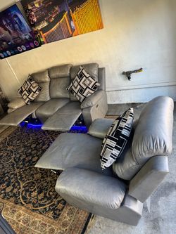* Like New * Ashley Furniture 2pc Modular electric recliners ( Free Delivery )