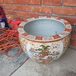 Old Pot, Plates And A Bowl