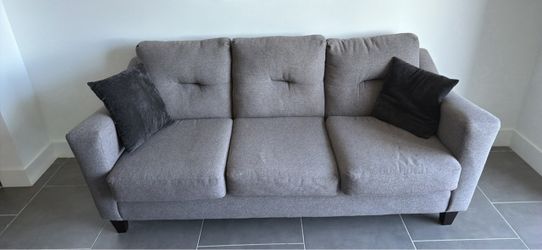 Grey fabric couch