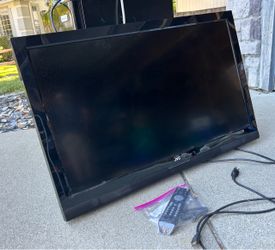 JVC Flat screen TV with remote and wall mount bracket. Older model flatscreen but still works great.