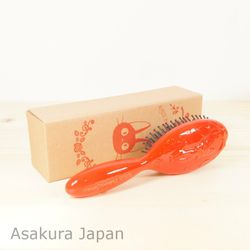 Kiki's delivery service Jiji comb