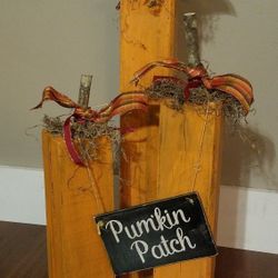 Handmade fall pumpkin porch decoration.
