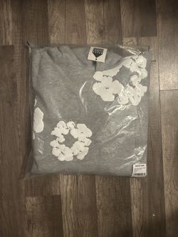 Gray and white denim tear