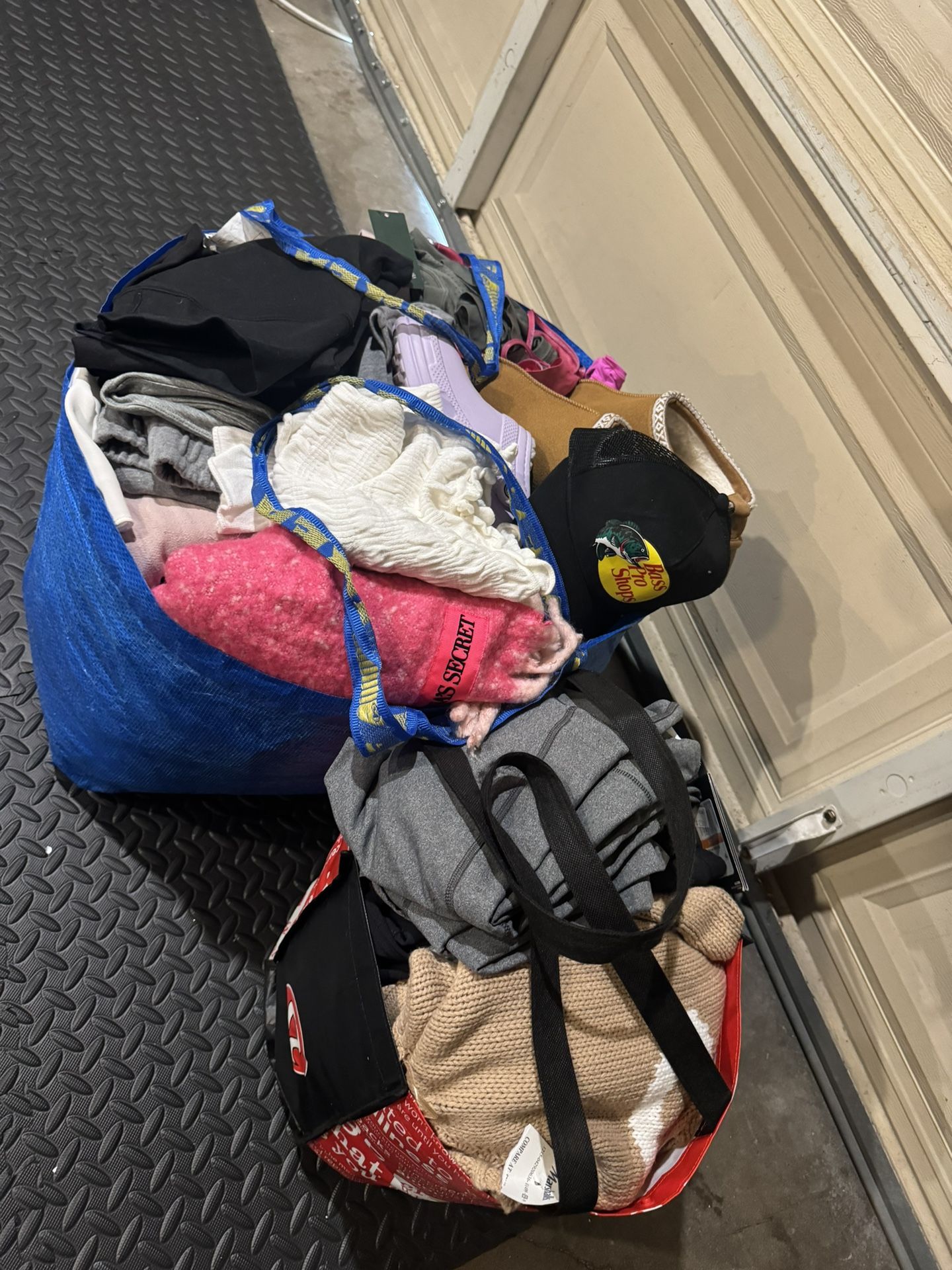 Two Bags Of Women’s Clothing