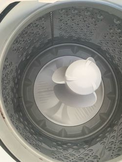 White LG top load washer